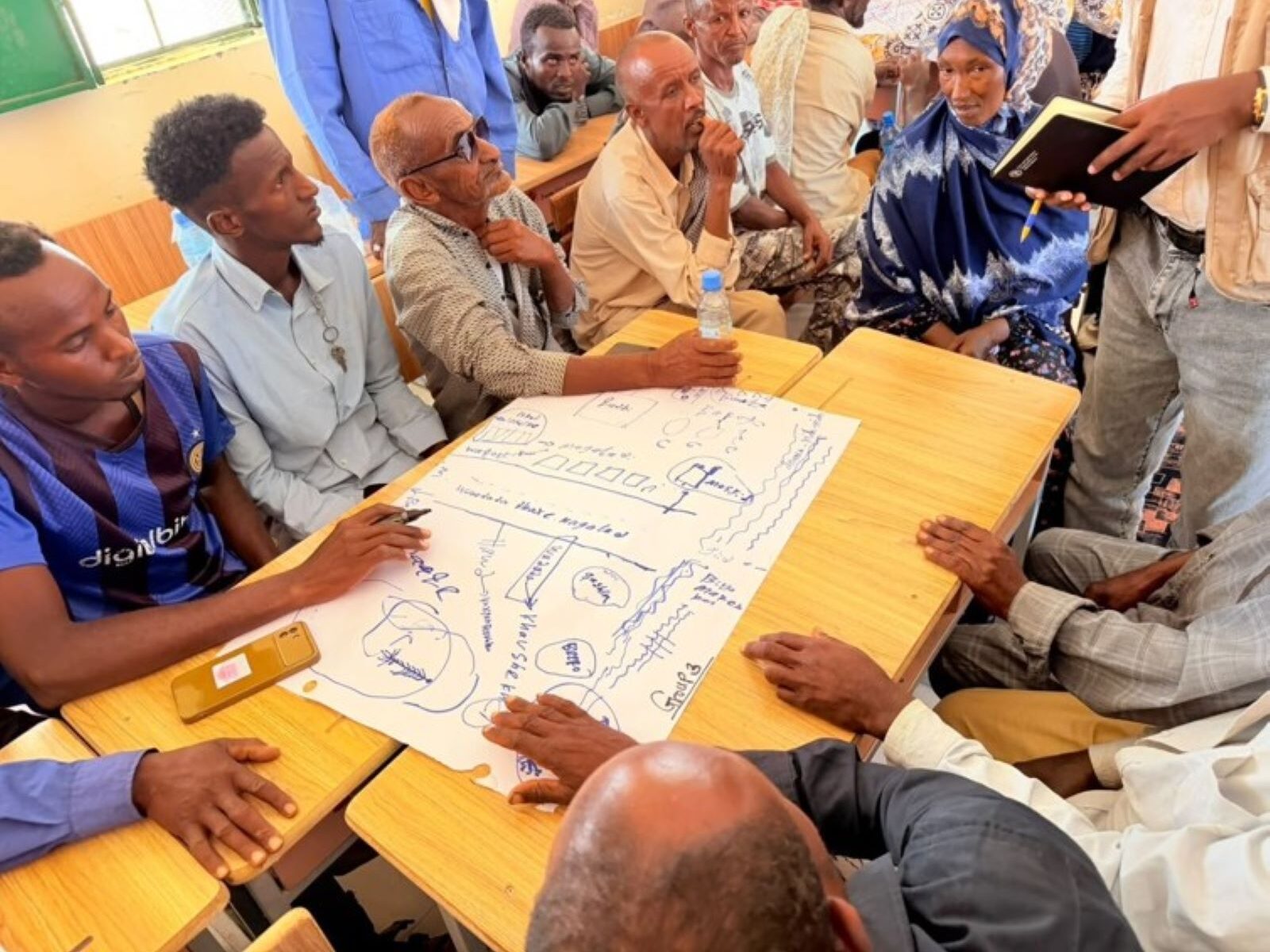 Staff of the Information Management Centre working at computers during a SWALIM training session.